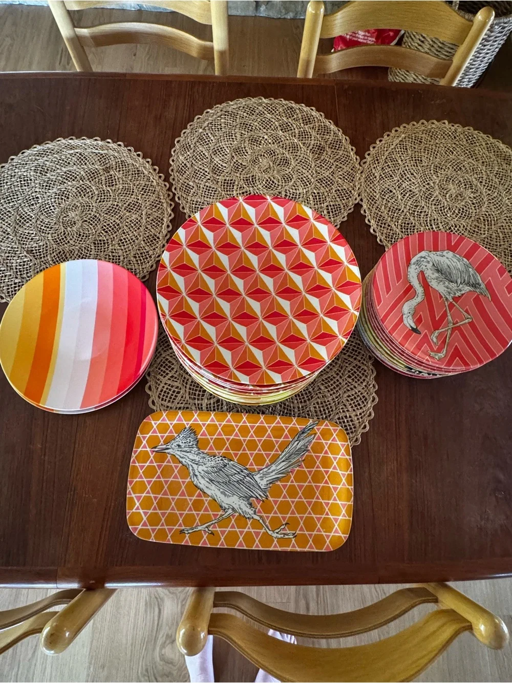 Set of 38 West Elm plates with colorful geometric prints & animal illustrations